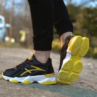 کتونی اسپرت سایز میانه ASICS مشکی زرد